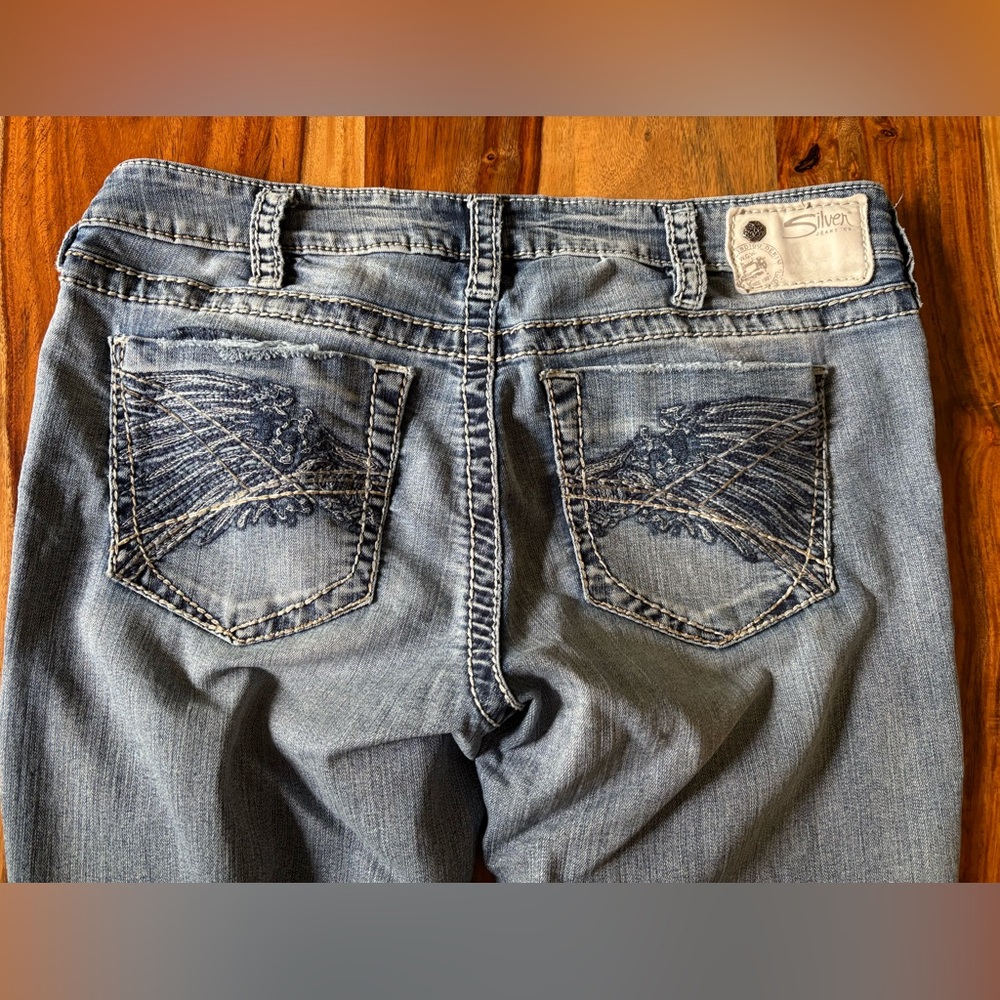 Silver Jeans Blue Boot Cut Denim with Distinctive Stitching